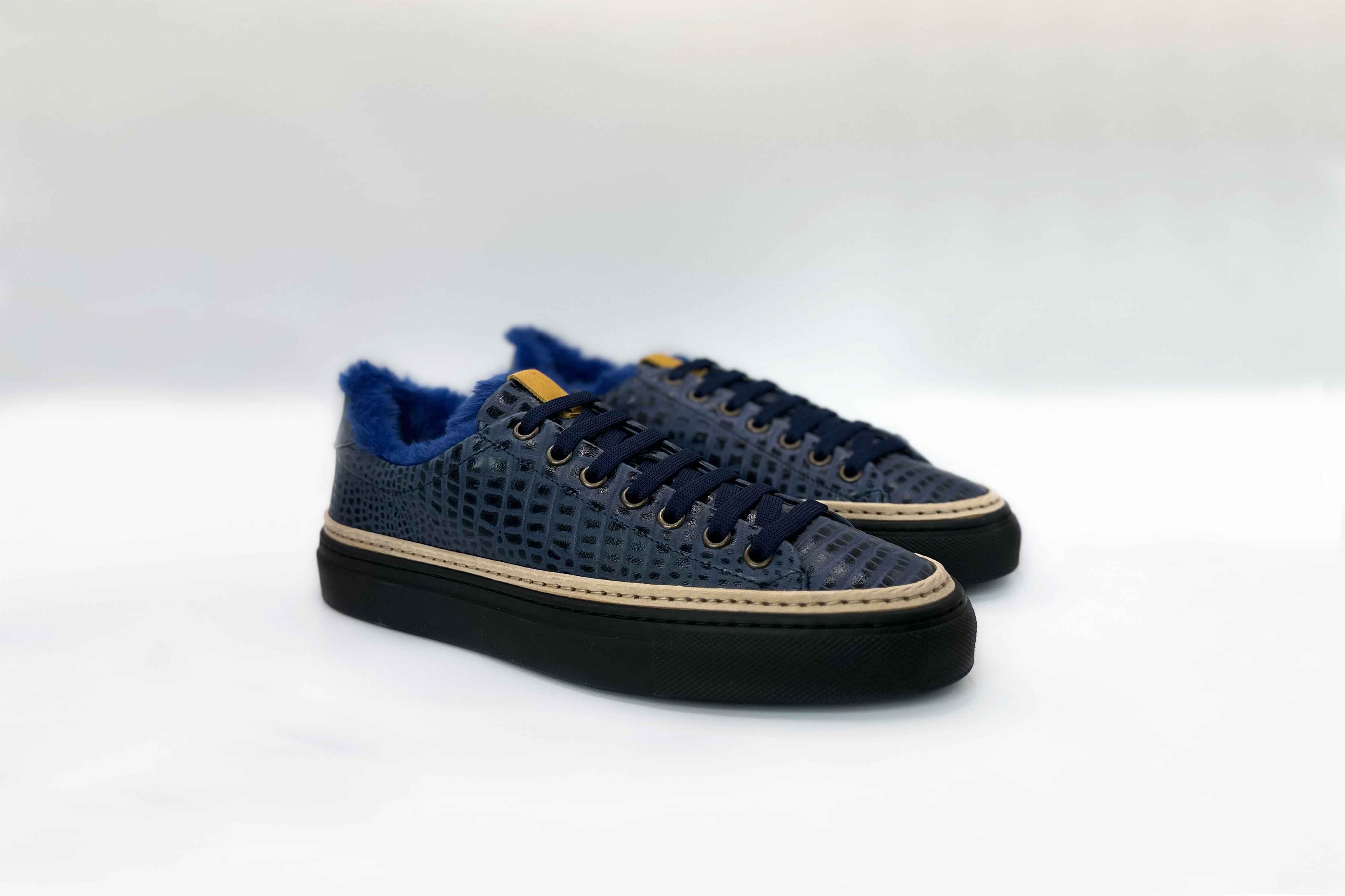 Navy leather best sale sneakers womens