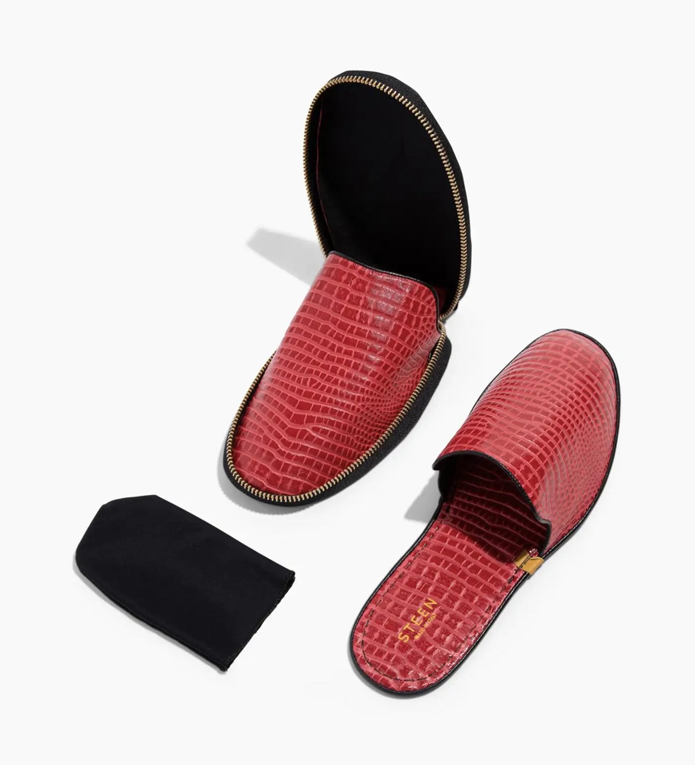 Red crocodile pattern women's slippers with zip detail and removable black insole